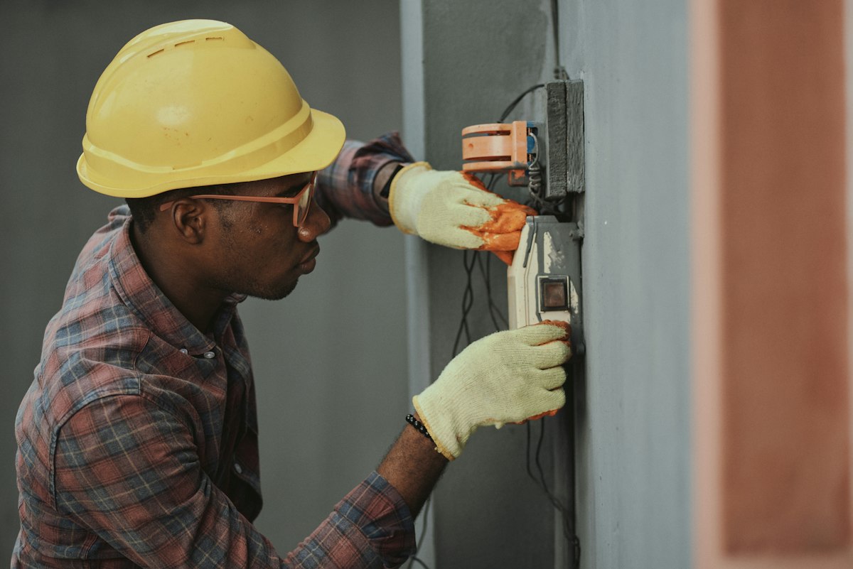 Technician working on home equipment